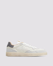 Side angle of white and grey sneakers
