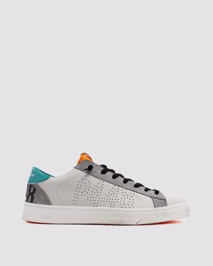 Side angle of white and blue sneakers