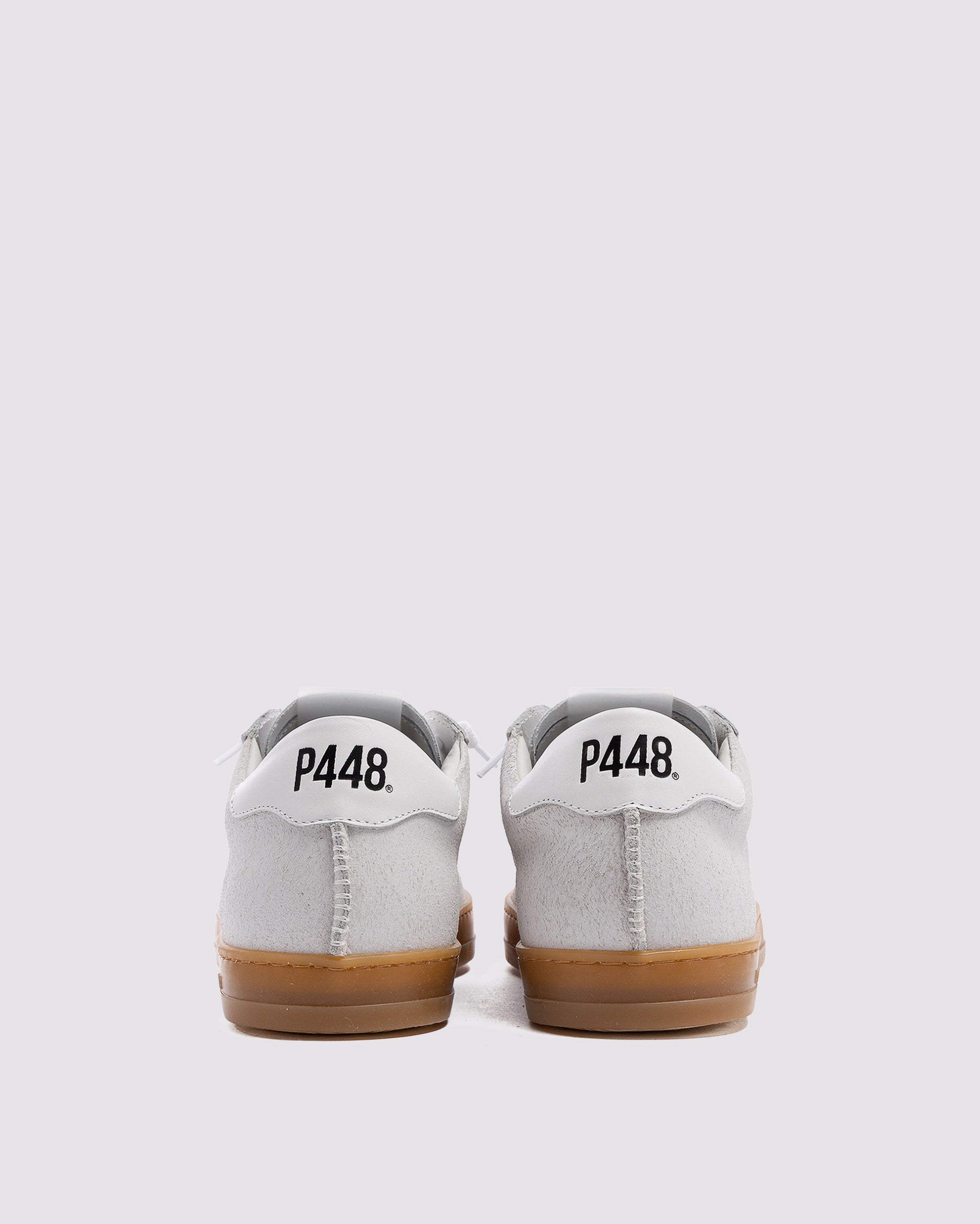 Side angle of off-white sneakers