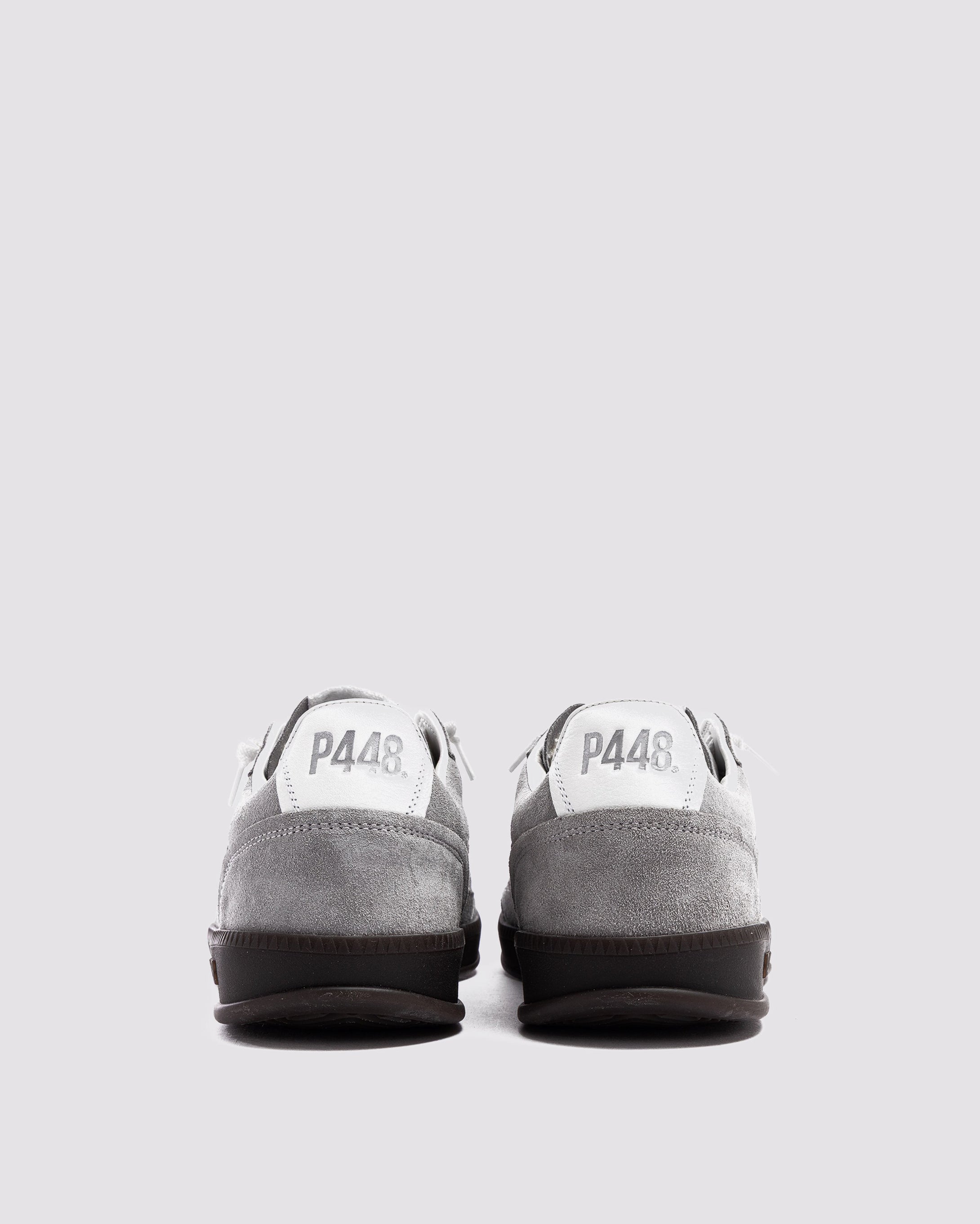 Side angle of grey and white sneakers