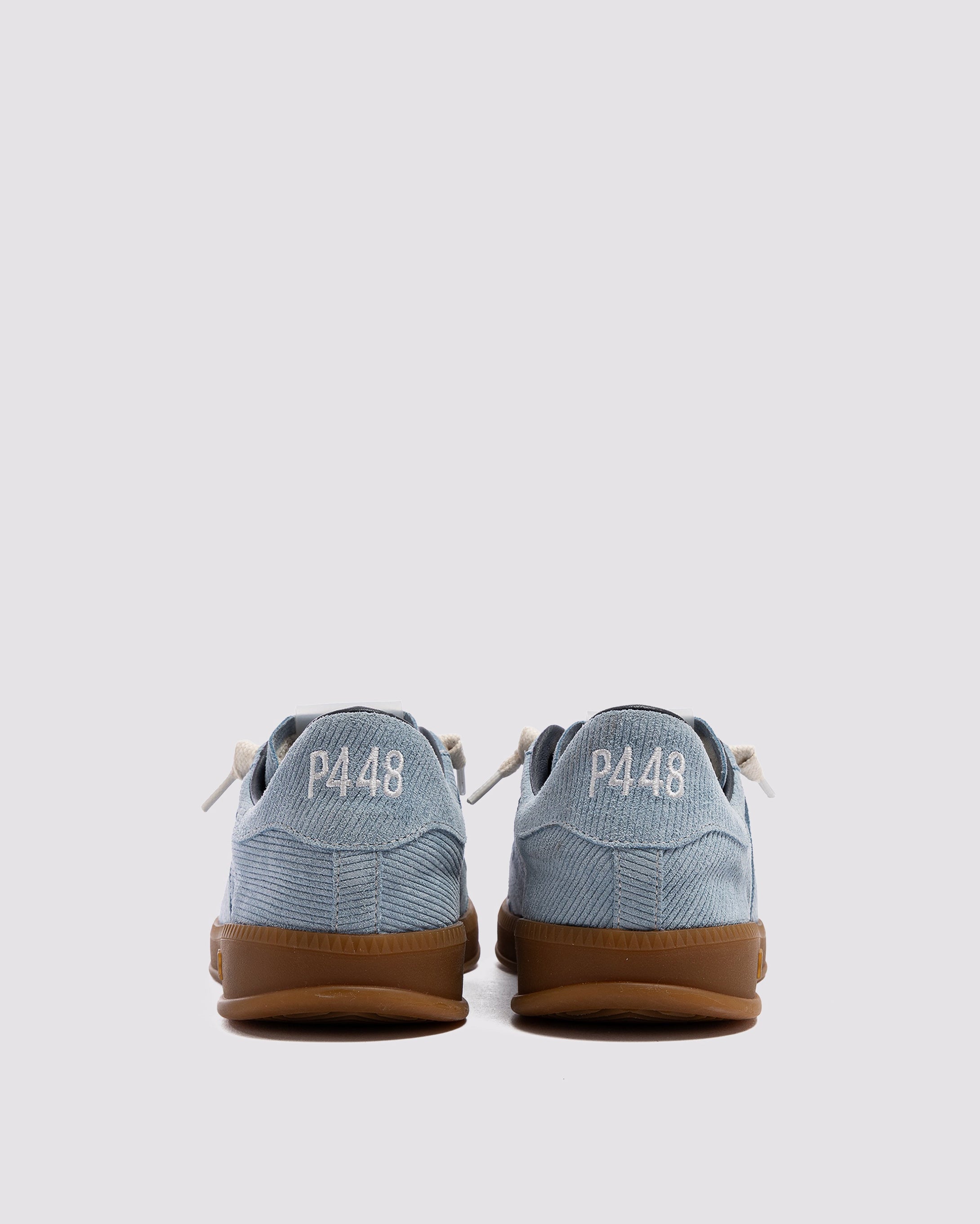 Side angle of blue sneakers