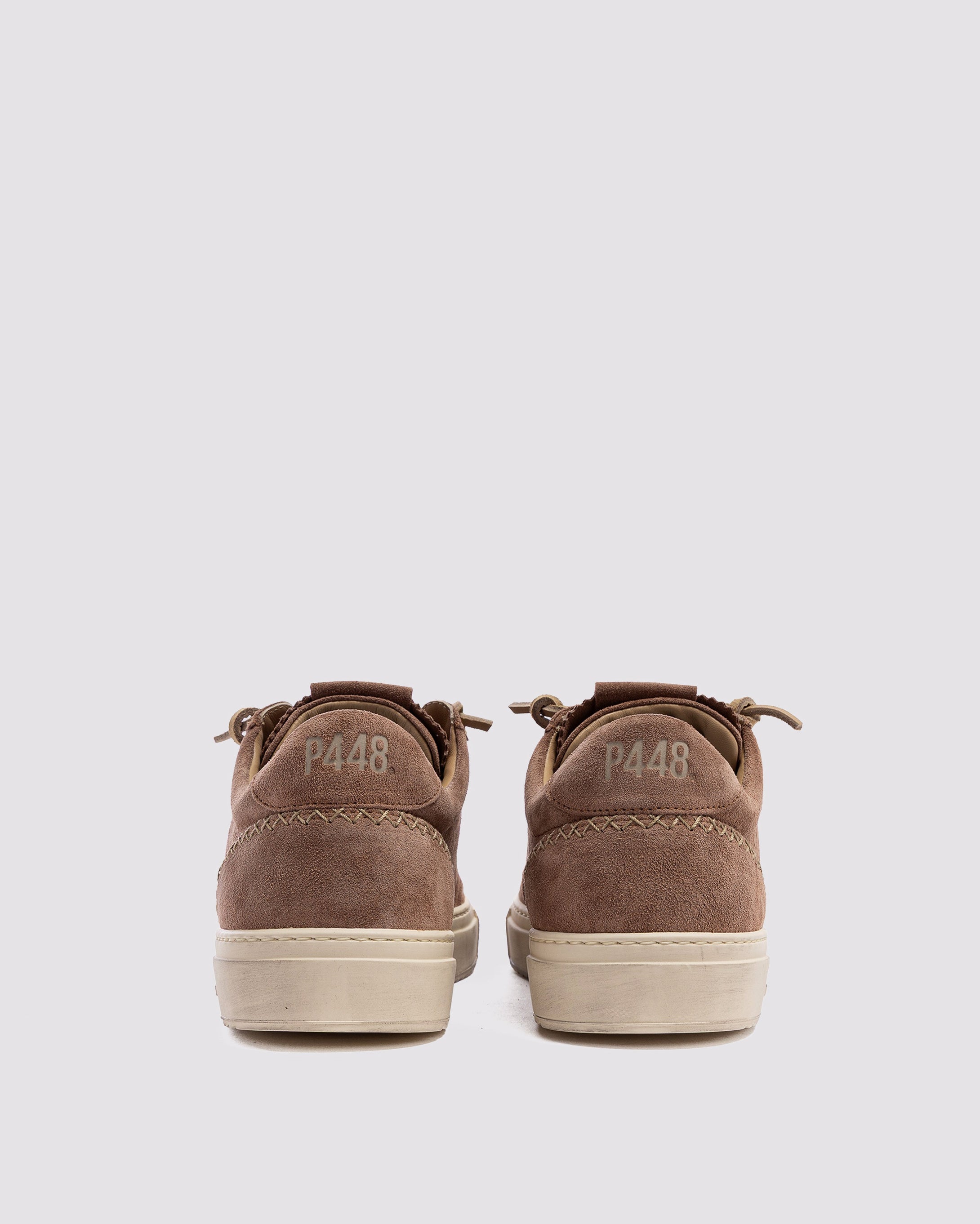 Side angle of brown sneakers